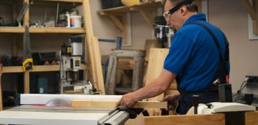 man-working-his-wood-shop-with-tools-equipment